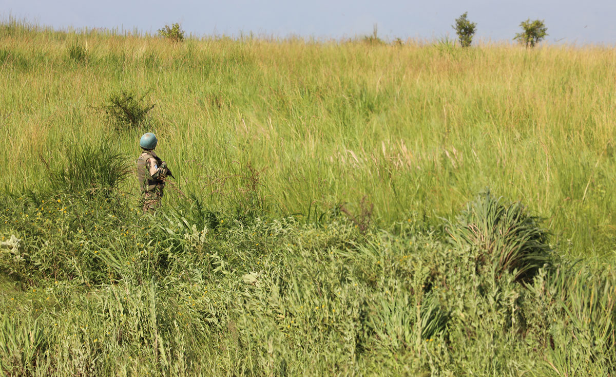 A peacekeeper serving with the United Nations Organization Stabilization Mission in the Democratic Republic of the Congo (MONUSCO) seen on patrol. UN Photo/Michael Ali.